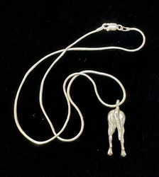 This pretty Sterling Silver pendant features the hind quarters of the horse, nice detail with a flowing tail.  Comes with a 16 inch Sterling Silver snake chain.  Pendant is 6/8th wide and 3/4th inches tall.