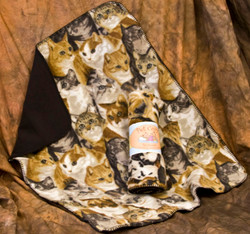 This Cozy is covered with cute kitties.  A great favorite with cats and dogs, these double thick fleece throws are the perfect size for your pet.  Machine wash gentle cycle with a mild detergent, and hang to dry.  They are a wonderful way to protect your furniture or car seat.  Perfect for use in cat and dog carriers too.  Edges are sewn with a blanket stitch. 

 
Measures 29" x 36" inches