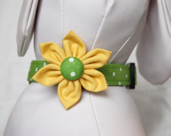 Green Polka Dots Chasin' Tail Flower attached to matching Collar

Chasin' Tail Doggie Designs are special handmade creations.  Each piece is made by hand, with care, in Boring Oregon.

Chasin' Tail Flowers are fun and attractive collar accessories.  These Flowers are available in 3 sizes and attached to your Chasin' Tail collar or any other collar with hook and loop attachments.

Flowers are made from a washable fabric.  Gently wash and hang to dry.  Chasin' Tail dog collar Flower accesories can be ironed with a cool iron to remove wrinkles if they should appear.

Chasin' Tail Flowers come in the following sizes,

SM - measures approx. 2" across

Med - measures 2 1/2" across

LG - measures 3" across


Chasin' Tail also offers matching handmade leashes, collars, and other accessories like Bow Ties to dress up any collar.  Look for them to order and complete your pet's special look.