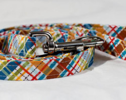 Multi Plaid Chasin' Tail Leash

Chasin' Tail Doggie Designs are special handmade creations.  Each piece is made by hand, with care, in Boring Oregon.

Chasin' Tail handcrafted leashes are 5 feet in lenght available in 3 widths.  They feature a durable swivel hook.

Leashes are made from a washable fabric.  Gently wash and hang to dry.  Chasin' Tail dog leashes can be ironed with a cool iron to remove wrinkles if they should appear.

Chasin' Tail leashes come in the following widths.


SM 5/8" wide

Med 3/4" wide

LG  1" wide

Chasin' Tail also offers matching handmade collars and cute collar accessories like Bow Ties and Flowers.  Look for them to order and complete your pet's special look.
