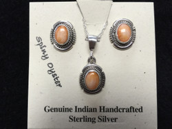 Spiny Oyster "stones" are beautiful set in this Sterling Silver stud earrings and matching pendent set. This set features stones that have a creamsicle orange color.

Spiny Oyster is truly made from Spiny Oyster shells.   These oysters have shells that range in colors and shades from pinks, reds, oranges, browns, yellows and even purples.

These are genuine Indian handcrafted Sterling Silver items.  Chain is included with set. 

Earrings and pendent measure approx. 1/2 in. long.