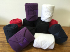 Polo Wraps made with durable Polar Fleece by Partrade to conform to your horses legs during work. Available in Red, Purple, Navy, White and Black. 

Measure 5" wide and 8.2' in length.  Set of 4 bandages