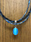 Another winner from Cowboy Collectibles!  Cabochon Necklace with authentic Horse Hair and beads and matching earrings.
cab·o·chon
ˈkabəˌSHän
noun: cabochon; plural noun: cabochons meaning - a gem polished but not faceted
  
  
 
These stunning horse hair necklaces are 18" long, have a lobster claw closure, feature a stone cabochon with coordinating beads.  Matching earrings feature hypo-allergenic posts. 
 
 Add a coordinating beaded wrap bracelet to complete the look.
 
 Handmade in Montana USA