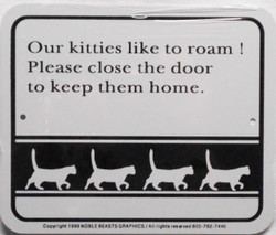 Our kitties like to roam! Please close the door to keep them home. / 5"H x 6"W / White & Black