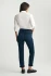 Back view of Mavi Kathleen ink brushed feather blue jeans showing back pockets, waist fit, and yoke detail