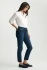 Side view of model wearing Mavi Kathleen slim boyfriend denim highlighting the relaxed fit and tapered leg