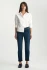 Full-length portrait of model wearing Mavi Kathleen ink brushed feather blue slim boyfriend jeans styled casually