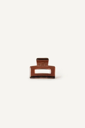 Front view of Kōv Essentials mini daily hair claw clip in cider warm tortoiseshell on a white background