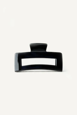 Front view of Kōv Essentials medium daily hair claw clip in classic solid black on a white background