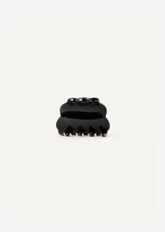 Front view of the Kōv Essentials black scalloped hair claw clip in muse on a white background