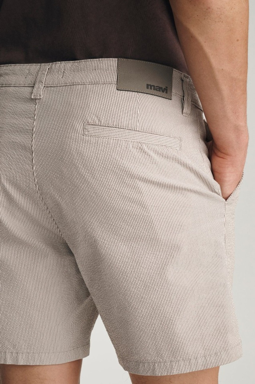 Back view of Mavi Nate sand seersucker shorts showing back welt pockets and waist fit