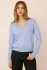Front view of Gentle Fawn Carina pullover in heather blue showing V-neckline and long sleeves