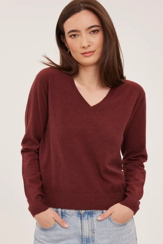 Front view of Gentle Fawn Carina pullover in bordeaux showing V-neckline and long sleeves