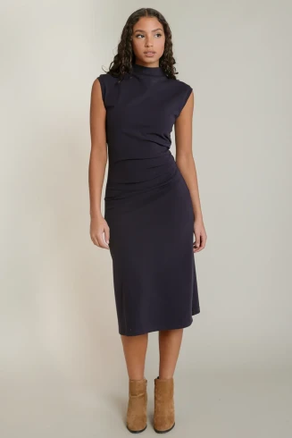 Front view of Black Tape Muse mockneck midi dress in navy showing mock neckline