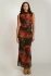 Full-length portrait of model wearing Dex floral mesh skirt styled with a casual top