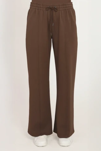 Front view of Dex scuba pull-on pant featuring smooth structured fabric and elastic waist