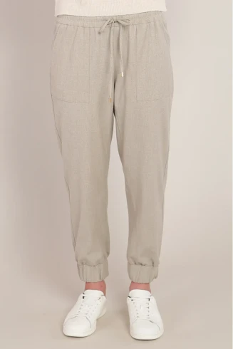 Front view of Room 34 cuffed hem pants in oatmeal showing waistband and cuffed hem detail