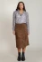 Full-length portrait of model wearing Dex suede midi skirt styled with a top