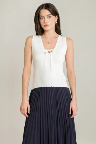 Front view of Black Tape scalloped knit top in cream showing neckline trim