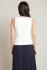 Back view of Black Tape cream scalloped knit top showing clean drape and knit texture