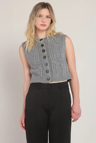 Front view of Room 34 button front cable knit sweater vest in grey showing V-neck and buttons