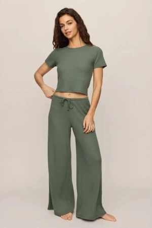Full-length far portrait of model wearing two-piece Z Supply waffle tee and pant set