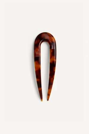Front view of the Kōv Essentials tortoiseshell French hair pin on a white background