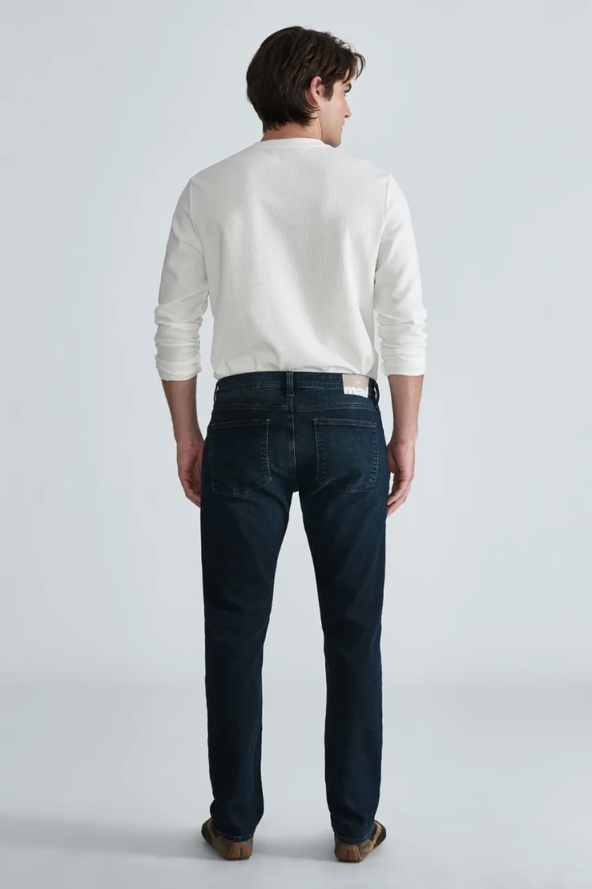 Back view of Mavi Marcus slim straight jeans in deep indigo classic vintage showing back pockets and waist yoke