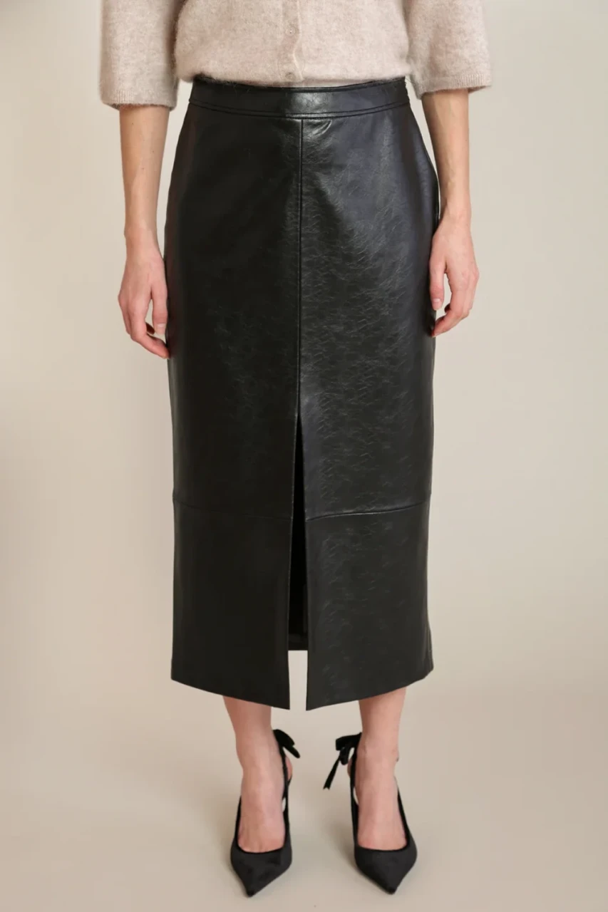 Front view of Black Tape faux leather skirt in black showing smooth finish and high waistband