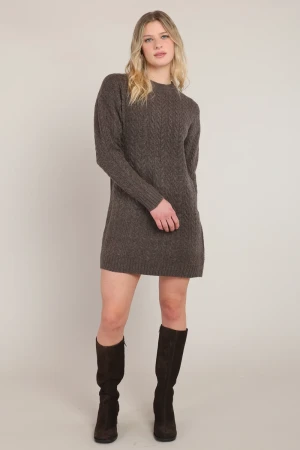 Full-length portrait of model wearing Room 34 chestnut heather Claremont cable knit dress styled with boots