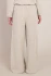 Back view of Room 34 beige Chalet cable knit pant showing wide leg drape and back waist