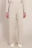 Front view of Room 34 Chalet cable knit pant in beige showing elastic waist and side cable texture