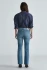 Back view of Mavi Vicky flare jeans in mid shaded classic blue showing back pockets and waist yoke