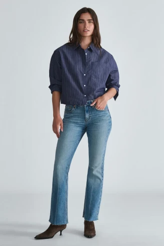 Front view of Mavi Vicky mid rise flare jeans in mid shaded classic blue showing waistband and front pockets