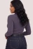 Back view of model wearing smoke grey Gentle Fawn Wren top showing fitted silhouette and long sleeves