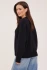 Back view of Gentle Fawn black Tilda sweater showing shoulders and ribbed hem