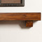 Close Up of Duluth Forge Fireplace Mantel Brown Finish
