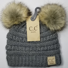 C.C BABY-43-POMPOM
Knit beanie featuring double faux fur pom pom.

-One size fits most: baby
-100% Acrylic
