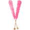 Two pink rock candy sticks