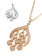 gold plated pendant with stones
