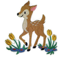 Fawn Frolicking In Flowers