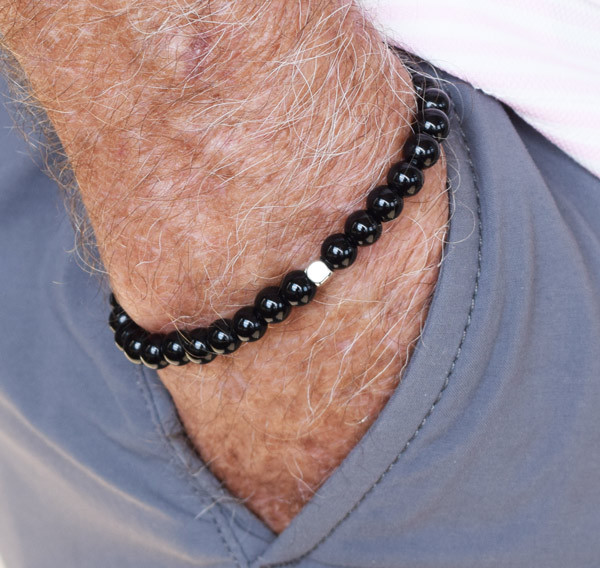 IonLoop  Onyx Stone 6mm Bead Bracelet...goes with everything.
Looks great with jeans, shorts, or a Tux, check it out.