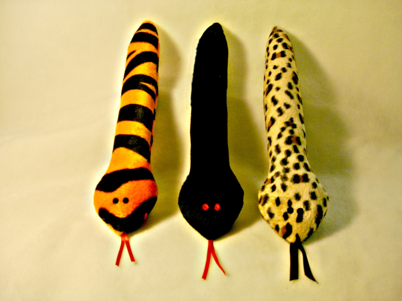 Safari Snakes are the bomb for your pet! These sturdy bodied, catnip filled, big cat print snakes will give your pet fun, fun, fun, for hours!
