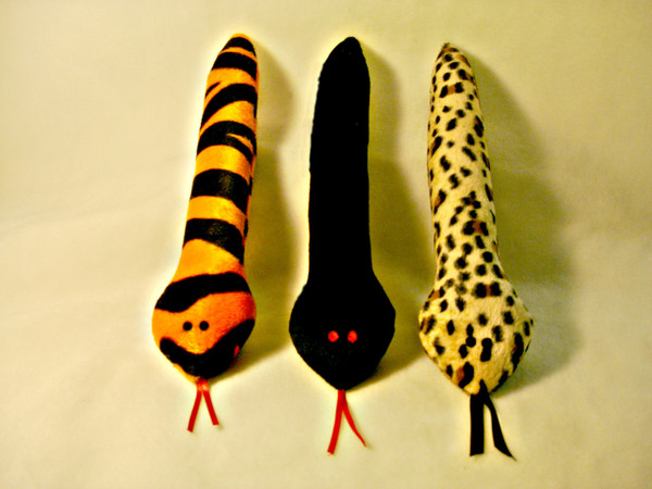 Safari Snakes are the bomb for your pet! These sturdy bodied, catnip filled, big cat print snakes will give your pet fun, fun, fun, for hours!