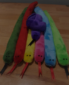 These Knot-a-Snakes are definitely one of our top 5 toys. They are made out of a soft, minky fabric and are stuffed full of our potent catnip. They can be tied in a knot to give your kitties a variety of ways to play. Whether they are batting around the knotted version or snuggling with the slender version this toy is sure to be a hit! Approximately 12.5 inches long.