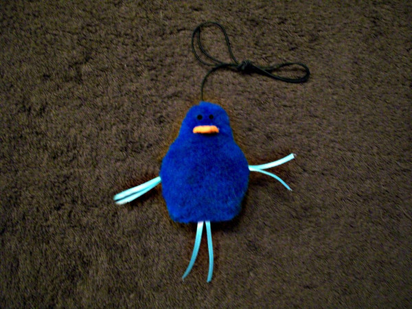 Playful catnip Blue Bird with attached elastic cord for lots of interactive fun!