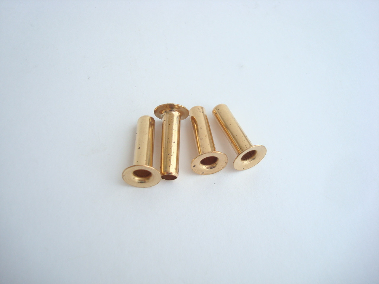 Corner grommets for wood wall telephones, box mounting grommets