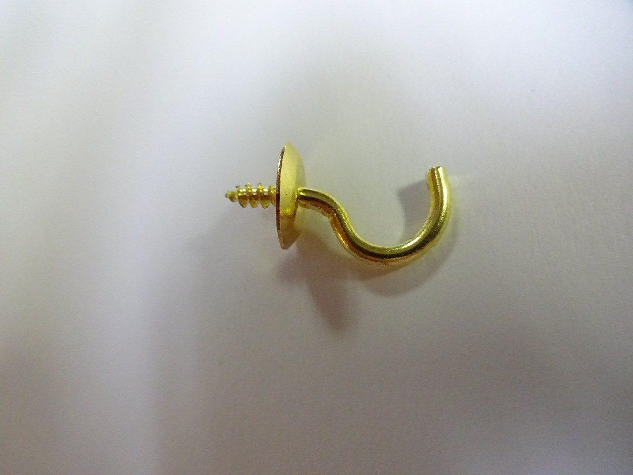 Antique wood wall phone directory hook. Used to hang old telephone