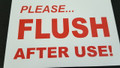 A 5 SIGN PLEASE FLUSH AFTER USE