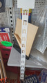 Plastic clip strip with 12 stations for hanging packs from